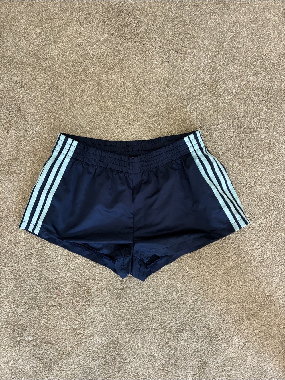 Edikted Navy Athletic Shorts with Light Blue Side Stripes
